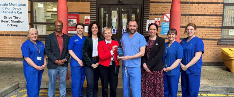 a group of people standing in front of a building